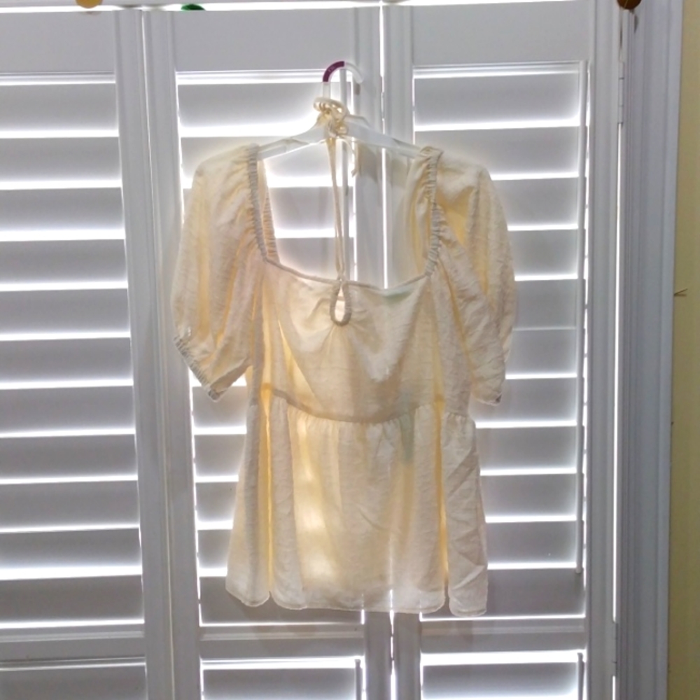 Cream colored blouse